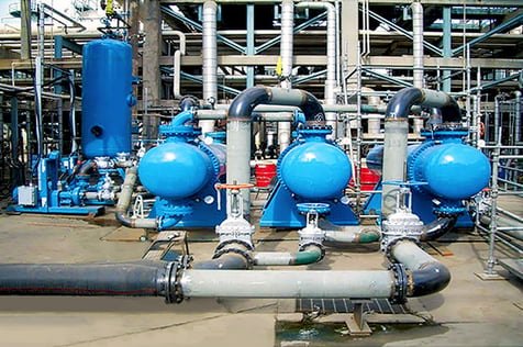 1 - What is A Heat Exchanger - Article - row of three blue heat exchangers