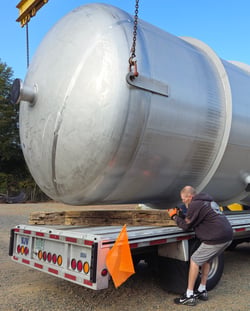 BEN - Guy loading tank on truck
